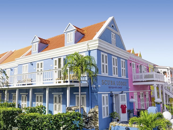 Scuba Lodge boutique hotel with colorful historic facades in Willemstad, Curaçao