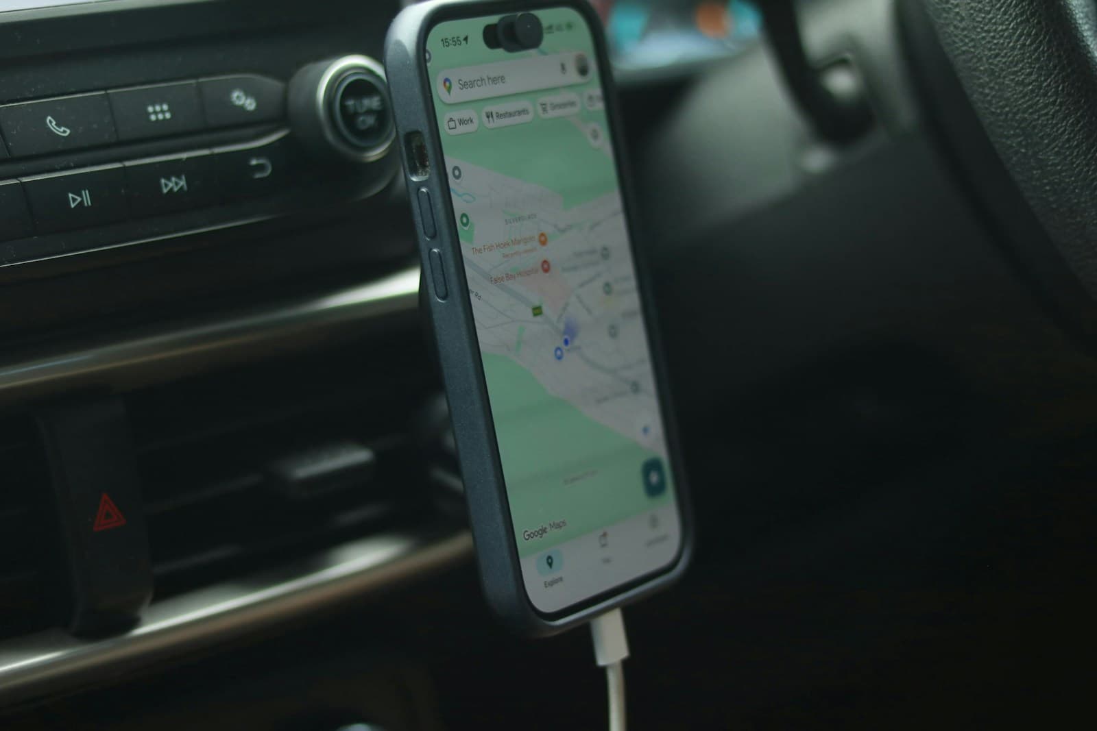 Google Maps navigation on a smartphone mounted in a car
