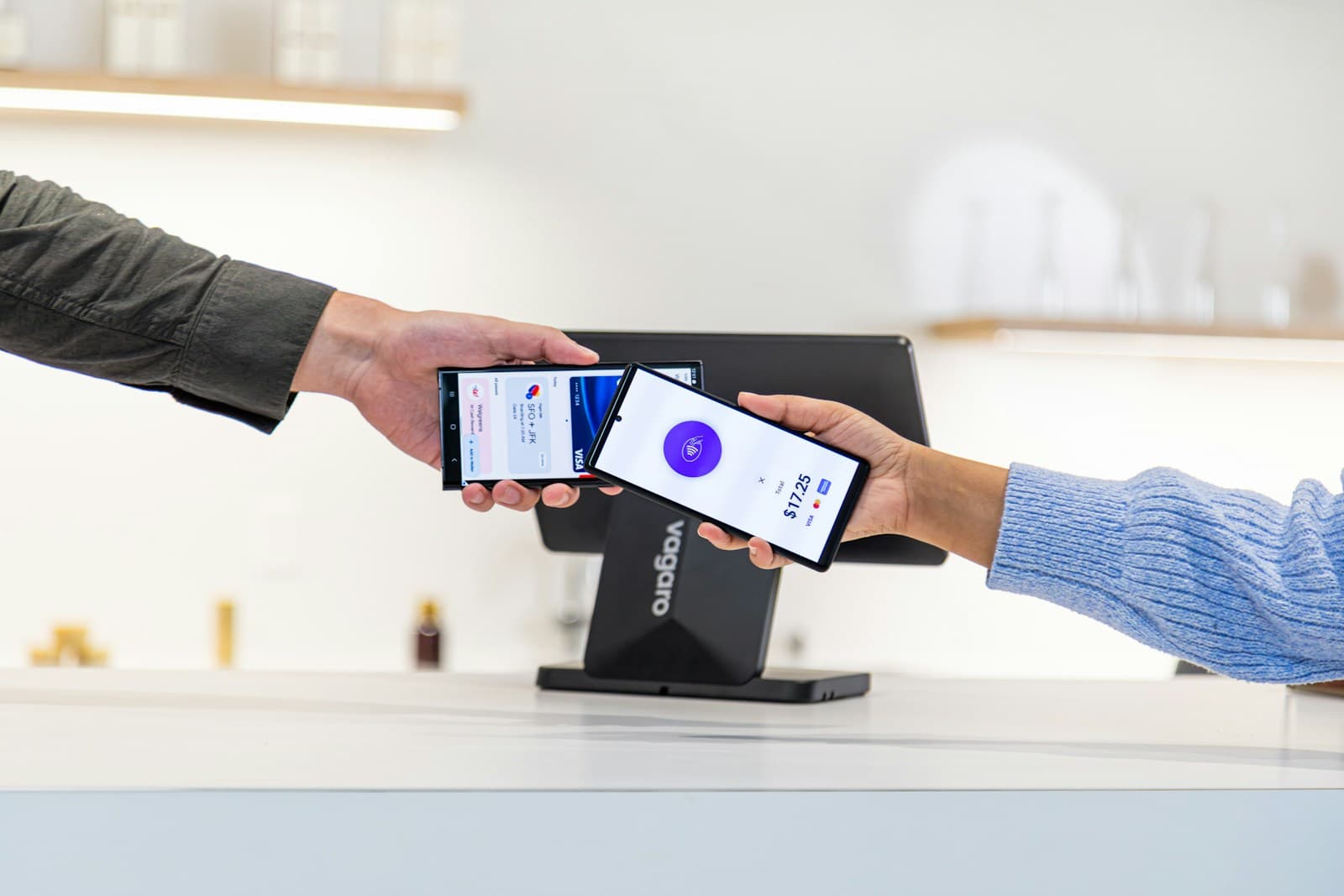 Contactless mobile payment between two smartphones at a café counter